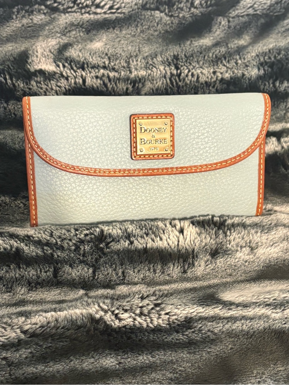 Dooney & Bourke Blue Pebbled Leather Continental Wallet with Brown Trim